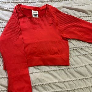 BRAND NEW, NEVER BEEN WORN GYMSHARK SEAMLESS CROP TOP COLOR: ORANGE SIZE: SMALL